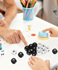 24 Piece Addition Subtraction Dice Set For Classroom Math Practice With 16mm Black And White Acrylic Symbols Featuring Plus And Minus Signs Fun Hands On Manipulatives For Kids Learning Games And Interactive Arithmetic Lessons on desk.