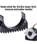 Top Tier Aluminum Stepper Motor Heat Sink Crafted To Keep Your 3D Printer Chill And Run Like Clockwork While Handling Rapid Heat Dissipation For NEMA14 And K1Max Compatible Rigs, displayed next to a motor.