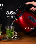 Red One Point Two Liter Cordless Electric Kettle 1500 Watt Fast Boil Stainless Steel Portable Tea Pot in use with cups
