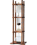 Slick Vertical Cold Brew Coffee Tower, 2500 Milliliter iced drip brewer with handblown glass jar and wood stand.