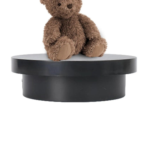 Cool Electric Turntable Display That Spins Your Goods 360 for Amazing Trade Fairs with a teddy bear on a black base