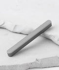 Single steel key from Eight Piece Go Kart Woodruff Key Set 6mm x 6mm x 60mm for Racing And DIY Maintenance on white background