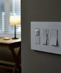 Radiant 600W Occupancy Motion Sensor Light Switch With Auto On Auto Off installed on a wall in a dimly lit room