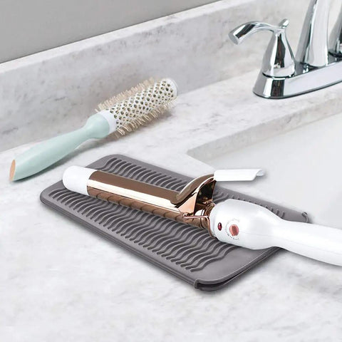 Heat Resistant Hair Tools Mat And Pouch Silicone Heat Mat And Holder For Curling Irons And Flat Irons on countertop with tools