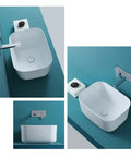 USZWBY Bathroom Vessel Sink White Bathroom Sink Fillet Deepen Basin Design Ceramic Vessel Sink Art Basin Above Counter Bathroom Sink for Lavatory Vanity CABI with modern faucet on teal countertop.