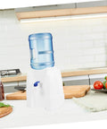 Portable Cold Water Dispenser For Office Desk Countertop With Tap no fuss easy pour plastic jug in a kitchen setting