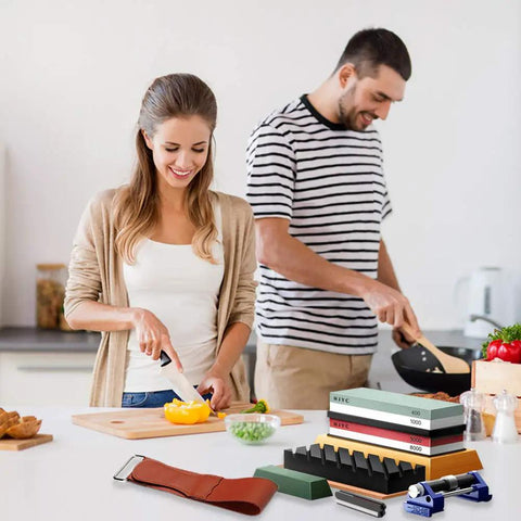 Couple in kitchen with Knife Sharpening Stone Set With 4 Sides Grit 400 1000 And 3000 8000 Water Stones All In One Whetstone Kit visible