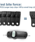 Heavy Duty Lock Grip Tarp Clips Hold Like Crazy With Rock Solid Non Slip Jaw Plus One Hundred Nylon Strap Ties For Securing Tarps Awnings Canopies And Outdoor Shelter Kit Complete Bundle showing comparison of large and small tarp clips with a force gauge.