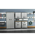 Garage with 4 Foot GearTrack Channels For Garage Walls Beefy Heavy Duty Wall Mounts 6 Inch High Panels holding tools and cabinets
