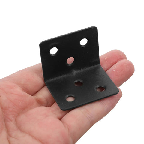 Beefy Heavy Duty L Shaped Corner Shelf Brackets with Screws 12 Pack cold rolled steel bracket in hand, showing pre-drilled holes