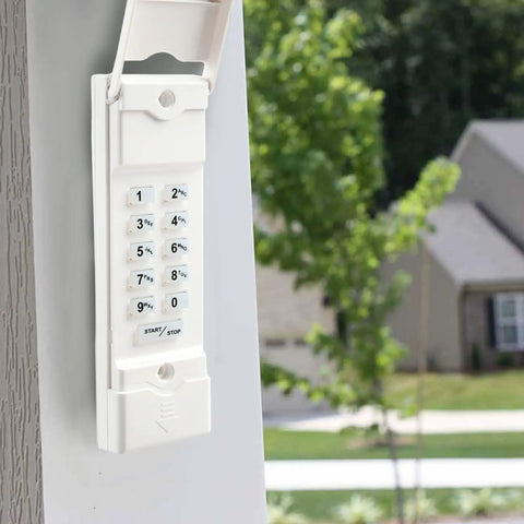Aftermarket Garage Door Keypad Replacement For Linear MDTK Easy Plug And Play Setup Includes 9V Battery And Mounting Hardware Clear Step By Step Programming Instructions FCC Registered In The USA mounted on garage wall