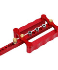 Self Centering Doweling Jig Kit With Premium Steel Bushings For Dead On Woodworking Alignments And Zero Sweat Setup in red aluminum.