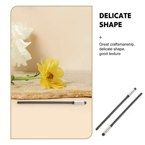 Ten Pairs Glasses Arm Replacement Kit With Metal Temple Tips next to yellow flower, highlighting delicate shape.