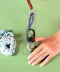 Person organizing scrunchies on Duo Pack Clear Acrylic Scrunchie Holder Organizer Set For Hair Ties, Bathroom Counter Stand.