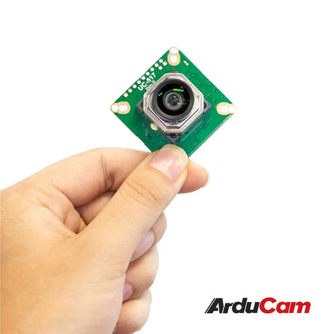 Person holding IMX477 Autofocus HQ Camera With Motorized Focus And I2C Control Fine Tune With Keyboard Arrows Or Autofocus With OpenCV 12MP Sensor 100 Degree FOV M12 Lens OpenCV Ready Jetson Orin NX AGX Orin Compatible No Hardware Mods Needed No Hassle Use module showing front view.