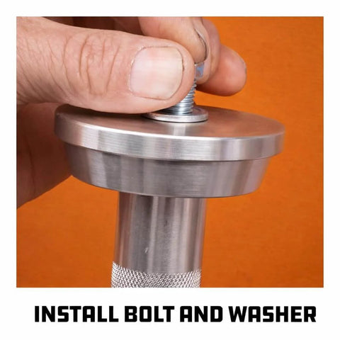 Close-up of a hand installing a bolt on the 10 Pc Master Bearing Race And Seal Driver Kit With 9 Precision Wheel Inserts