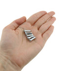 Hand holding 36 Pack 12mm Mountain Bike Spoke Nipples Silver for 14G Wheels, Rust Resistant CNC Anodized Spoke Caps