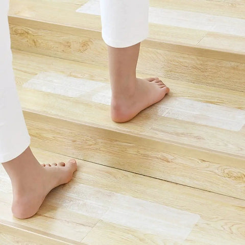 Pre Cut 30x6 Anti Slip Stair Treads 15 Pack With Roller Clear Non Slip Grip Strips on wooden stairs with bare feet