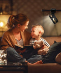 Mother and child reading under Portable USB Clip On Fan With 12000mAh Battery And 65 Hours Runtime, LED Lights, Hook And Clamp