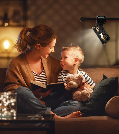 Mother and child reading under Portable USB Clip On Fan With 12000mAh Battery And 65 Hours Runtime, LED Lights, Hook And Clamp