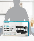 Total Game Changer Two Pack Under Sink Cabinet Organizer Rack With Sturdy Hooks And Hanging Cup To Slap Order On Messy Closets For Cleaners Bottles And Kitchen Goods in packaging on kitchen counter.