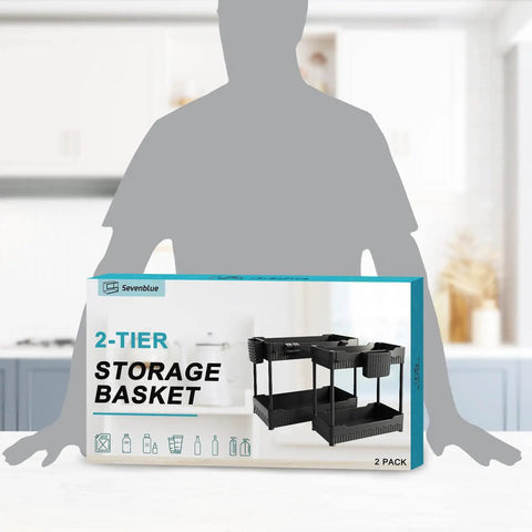 Total Game Changer Two Pack Under Sink Cabinet Organizer Rack With Sturdy Hooks And Hanging Cup To Slap Order On Messy Closets For Cleaners Bottles And Kitchen Goods in packaging on kitchen counter.