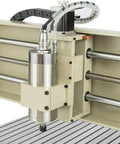 Close-up of Beefed Up USB 4 Axis CNC 6090 Router Kit With MACH Control and 1.5 kW Water Cooled Spindle, metal axis visible.