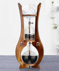 Portable Cold Brew Drip Tower With Smooth Flow Dial And Hefty 1000 Milliliter Pitcher for iced coffee, wooden design with ice chamber.