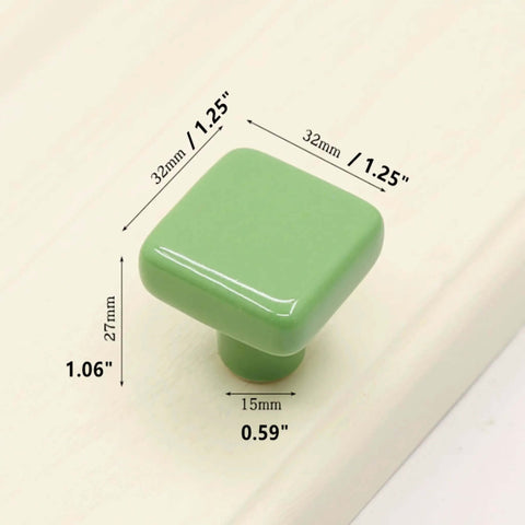 Glossy Ceramic Square Cabinet Knobs 1.25 Inch Green Six Pack Kid Friendly with dimensions on wood surface