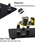 Magnetic Helping Hands With Three LED Magnifying Lamp showing magnetic holders and rubber pads securing electronics on base.