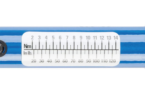 Close-up of torque scale showing 2-14 Nm and 18-124 in-lb range on a Ratcheting Torque Wrench With A 2 To 14 Nm Range And 18 To 124 Inch Pounds Readout Three Eighth Inch Drive Left And Right Threading Dial Preset And Calibrate Feature For Quick Precise Bike And Auto Repairs Beast.