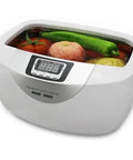 Top Tier Two Point Five Liter Ultrasonic Cleaner With Silent Smooth 40Khz Operation and Digital Five Stage Timer filled with fruits.