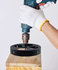Rannb 9.5-inch bi-metal hole cutter on drill, cutting a hole in wood (side view)