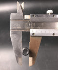 DONSP1986 clutch repair kit components (bucking bar, camshaft shifting rod, clutch arm) shown with a metal caliper.