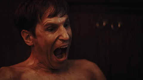 Man screaming in a scene from Cat Sick Blues Blu Ray Region Free Edition A Dark Gripping Gritty Indie Drama About Grief After A Cat Dies As A Man Falls Into Delusion And Obsession This Mind Bending Nightmarish Tale Delivers Raw Emotional Intensity And Sharp Cinematic Mood.