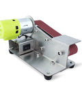 Heavy Duty Mini Belt Sander With Seven Adjustable Speeds And A Steady Fifteen Degree Fixed Setup For Fast Wood Work Metal Polish Stone Grind Plus Eight Ninety Five Watts Of Raw Horsepower To Crush Any Diy Task Straight Up showing compact stainless steel design and motor.