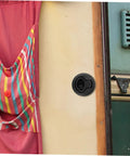 Round black flush pull slam latch installed on boat/RV cabinet panel