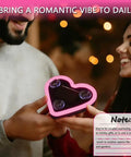 Couple holding Solar Powered Heart Light For Cars Wireless LED Ambient Lamp with suction cups, pink heart shape.