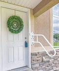 Rock Solid Wall Mount Stair Railing For One To Three Steps With Heavy Duty Grip And All Weather Build, white steel mounted by door.