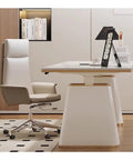 Super Slick Electric Standing Computer Desk With Four Memory Height Presets, Smooth Sit Stand Adjustments, Dope Modern Slate Top, Total Home Office Game Changer For Daily Productivity Flow next to a modern office chair.