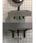 Heavy-Duty Wall Mount Shelf Brackets, Solid Steel Triangle Supports For Floating Shelves, supports a concrete sink with plumbing.