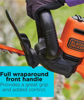 Close-up of 22 Inch Electric Hedge Trimmer With Dual Action Blades And Full Wraparound Handle in use.
