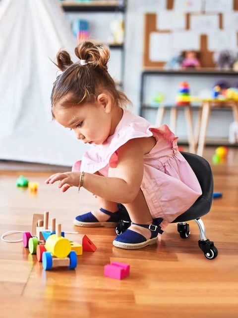 Child playing with blocks on Low Profile Rolling Stool On Wheels With Back Rest And Leather Cushion 360 Degree Swivel Compact Round Seat