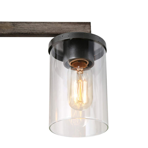 Close-up of Farmhouse Vanity Light Fixture With Faux Wood Finish And Clear Glass Shade, showcasing 4 Light Rustic Industrial Style