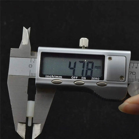 M2.5 Nylon Hex Standoff And PCB Spacer 100 Piece Pack White 94V2 Flame Resistant Electronic Hardware measuring 47.8mm with caliper.
