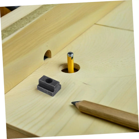 Six Piece Slot Fastening Nuts And Bolts Set For T Slot Tracks And Machine Tool Applications, with pencil on wooden board