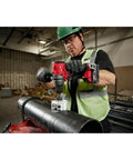 Professional Heavy Duty Brushless Cordless Drill Driver With Half Inch Chuck And Auto Stop Feature 18V Compatible Bare Tool drilling into metal pipe.