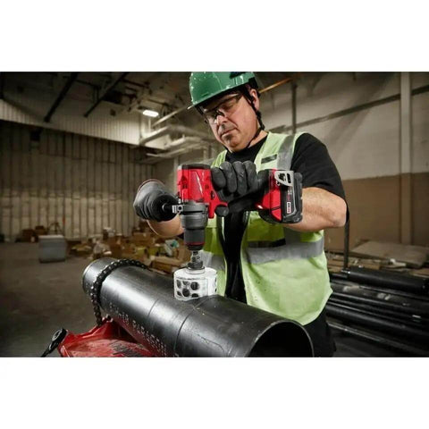 Professional Heavy Duty Brushless Cordless Drill Driver With Half Inch Chuck And Auto Stop Feature 18V Compatible Bare Tool drilling into metal pipe.