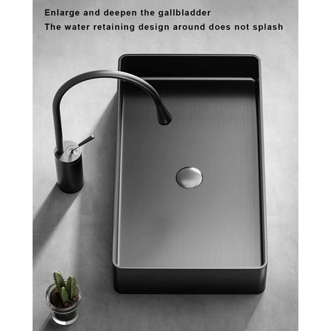 Modern Black 304 Stainless Steel Countertop Bathroom Sink Paired With Streamlined Faucet, top view showing sleek design and shallow edges.