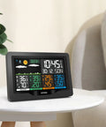 Wireless Weather Station With Indoor And Outdoor Sensors and 7 Inch Color Display showing temperature and humidity.